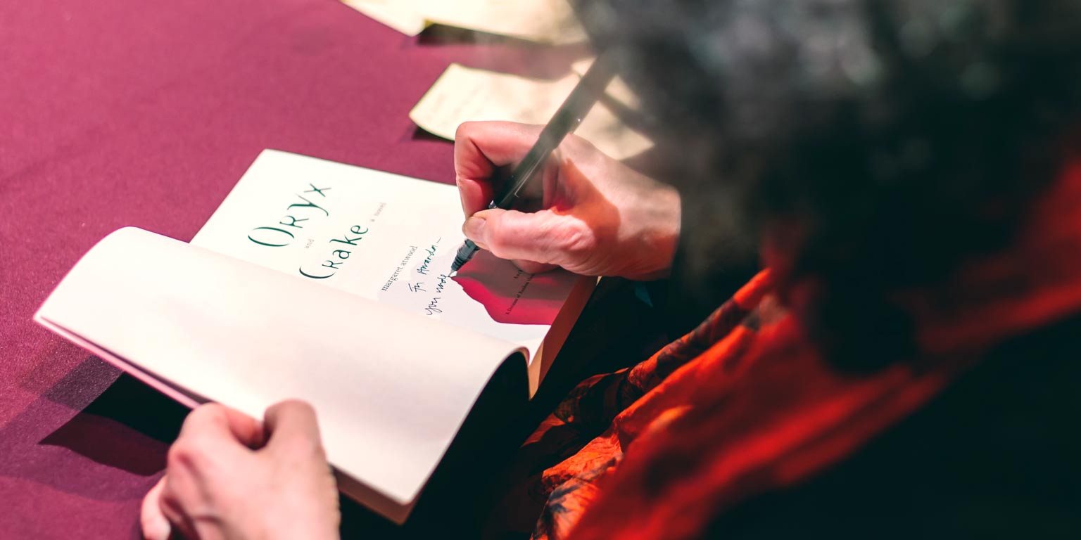 author Margaret Atwood signs her book